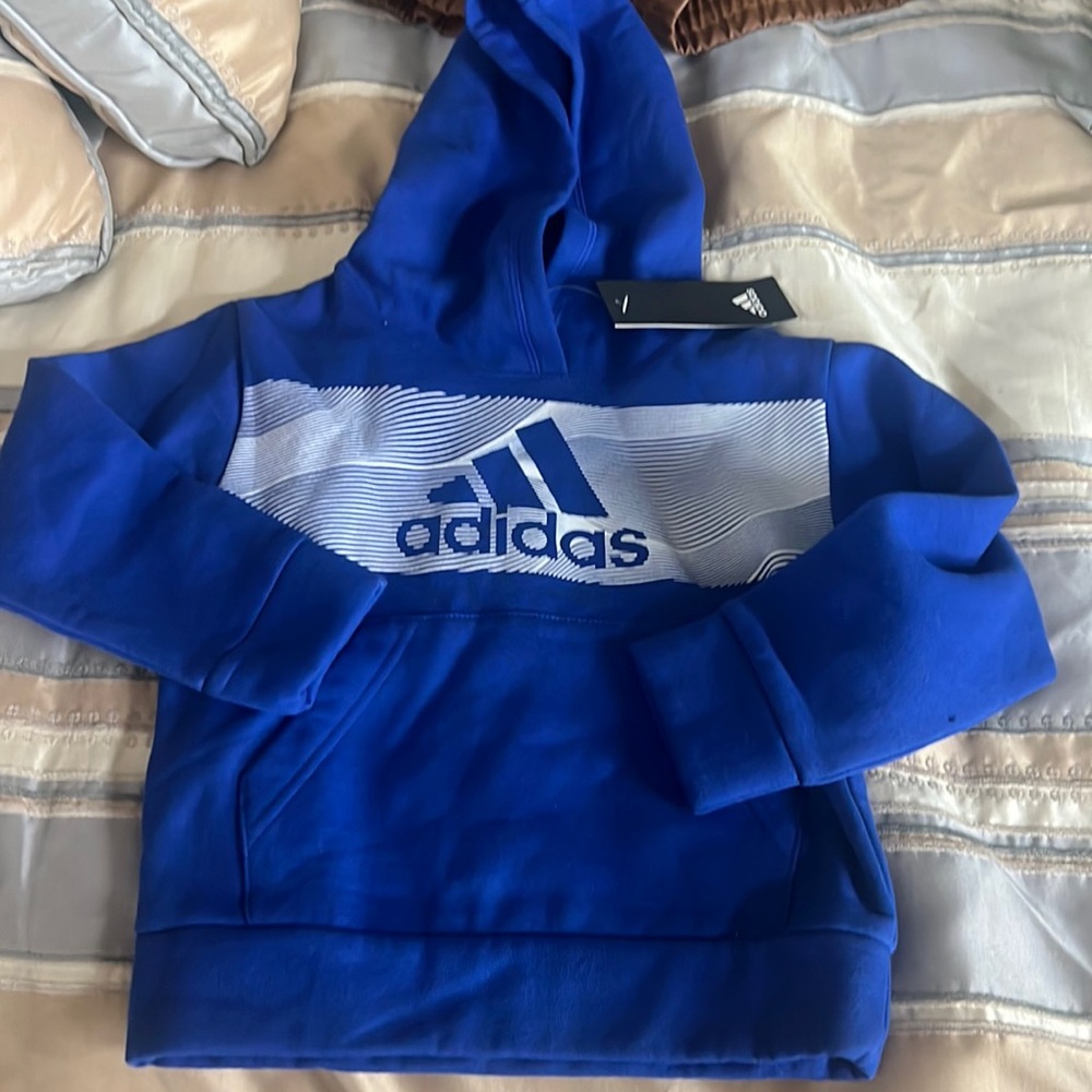 adidas Pullover Hoodie Kids', Blue, Size 4
New with front pockets